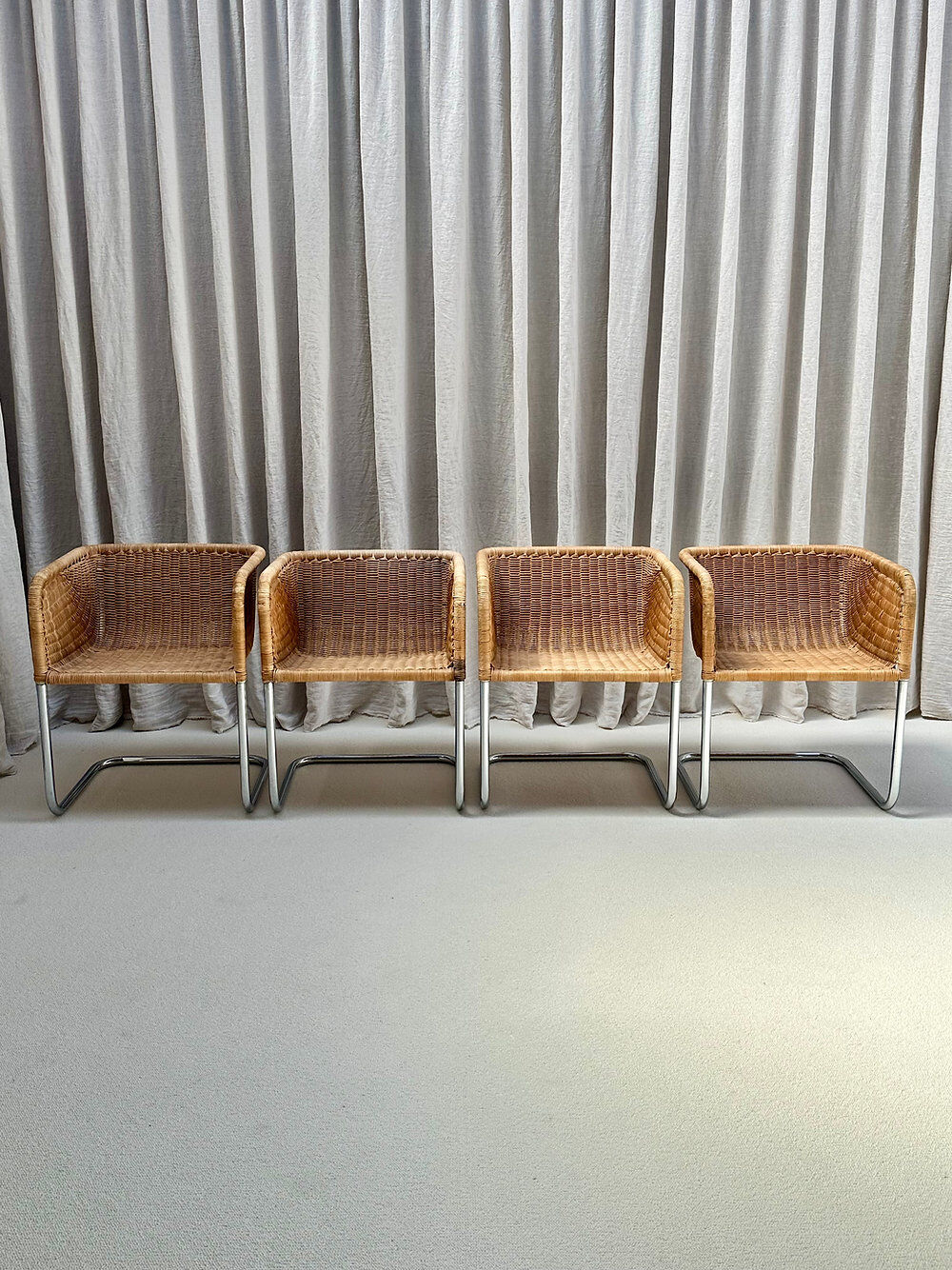 Set of 4 cantilever wicker chairs, attributed to Harvey Probber, USA, 1970s.