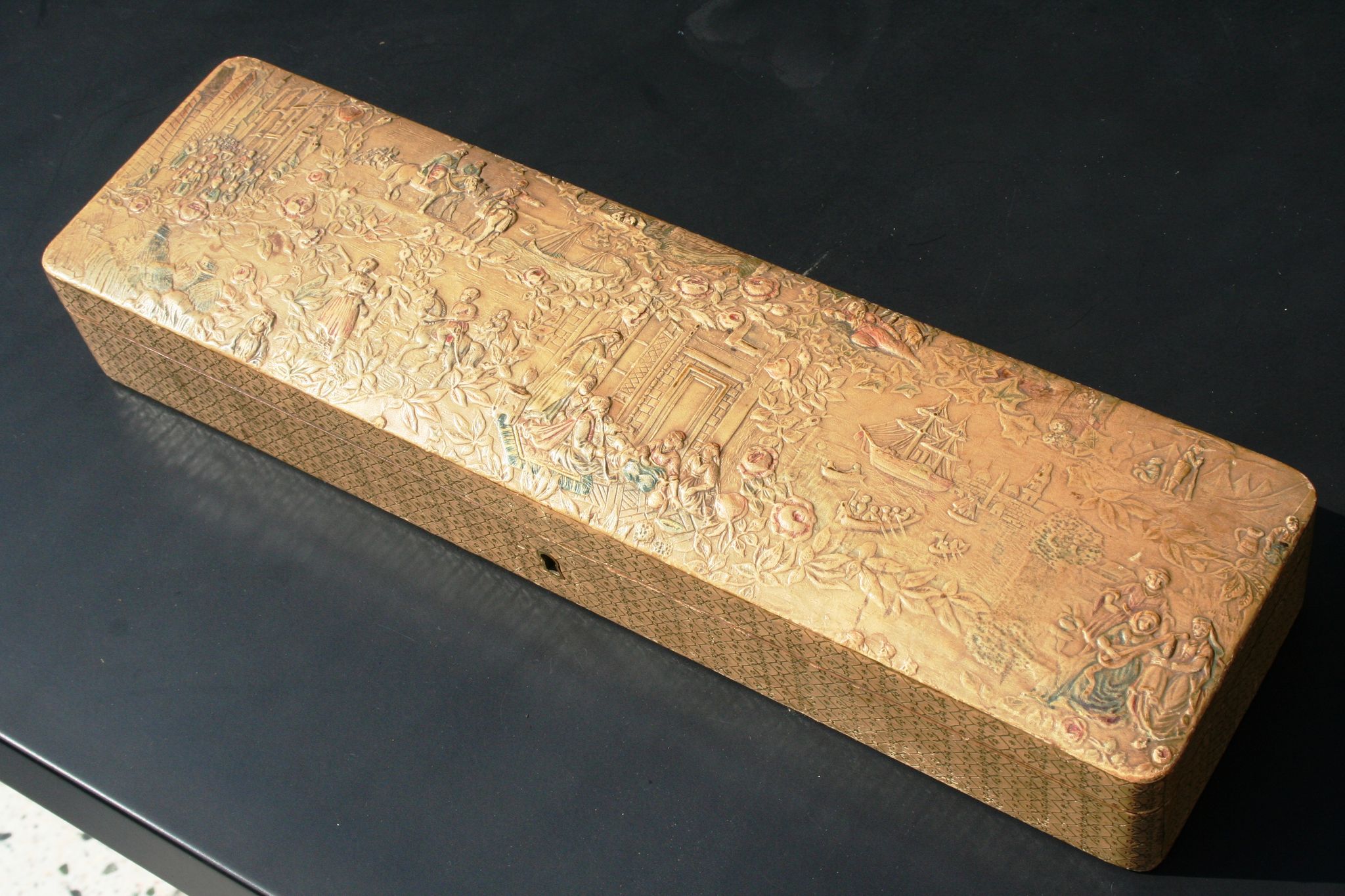 Old embossed leather glove box decorated scenes