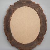 Miroir ovale doré et sculpté en bois. Miroir vintage. Miroir mural.