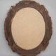 Oval mirror in gilded and carved wood. Vintage mirror. Wall mirror.