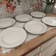 Set of 6 flat plates in fine white Bohemian porcelain with a gold rim.