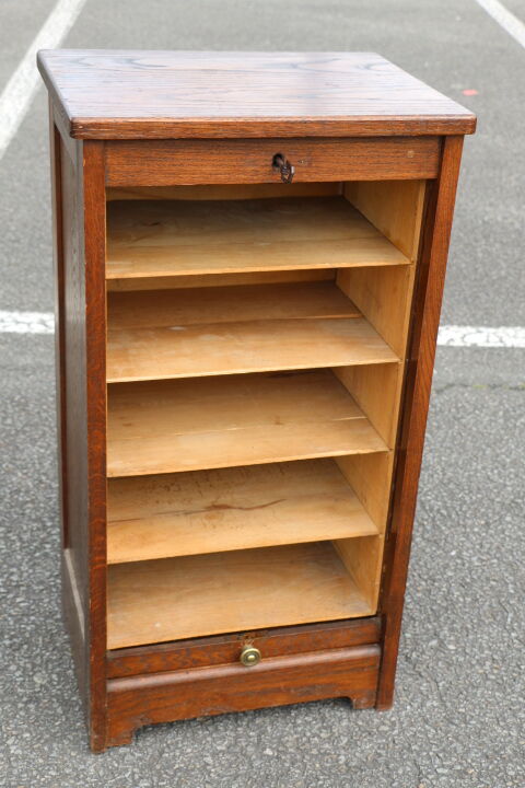 Dark single curtain cabinet