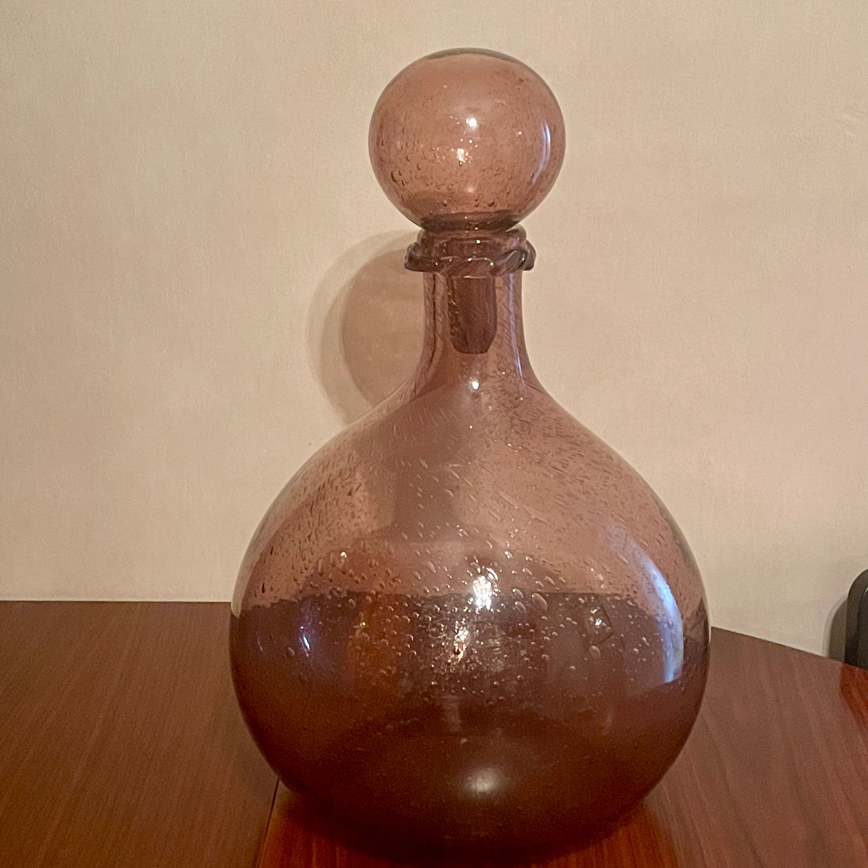 Bottle  in blown and bubbled glass
