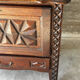 Small storage cabinet in carved oak – circa 1930
