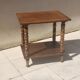 Vintage wooden console side table with turned legs.