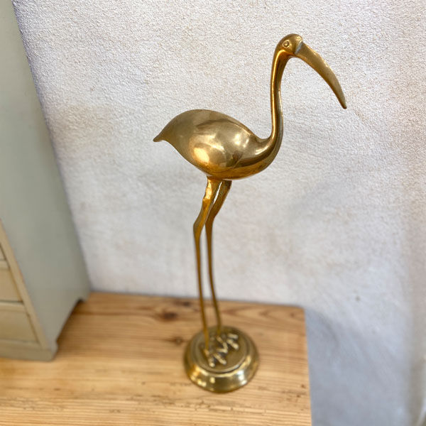 Ibis or heron in gilded brass