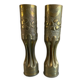 2 shell casing vases