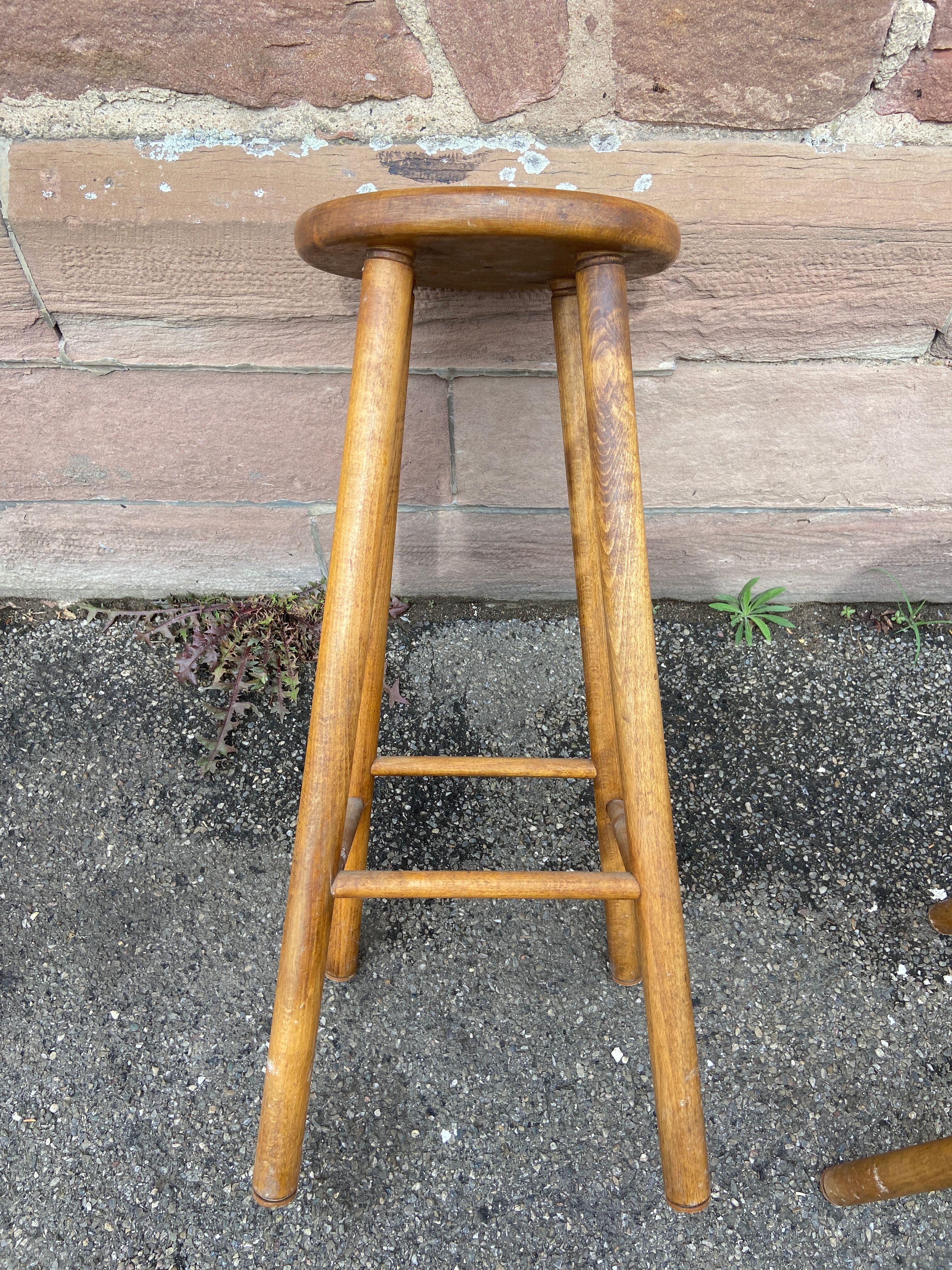 pair of vintage wooden bar stools