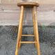 pair of vintage wooden bar stools