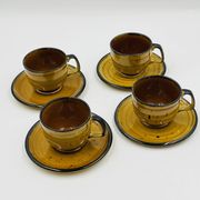 Set of four vintage Boch Palma cups and saucers.