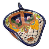 Empty pocket with floral patterns in the shape of a leaf