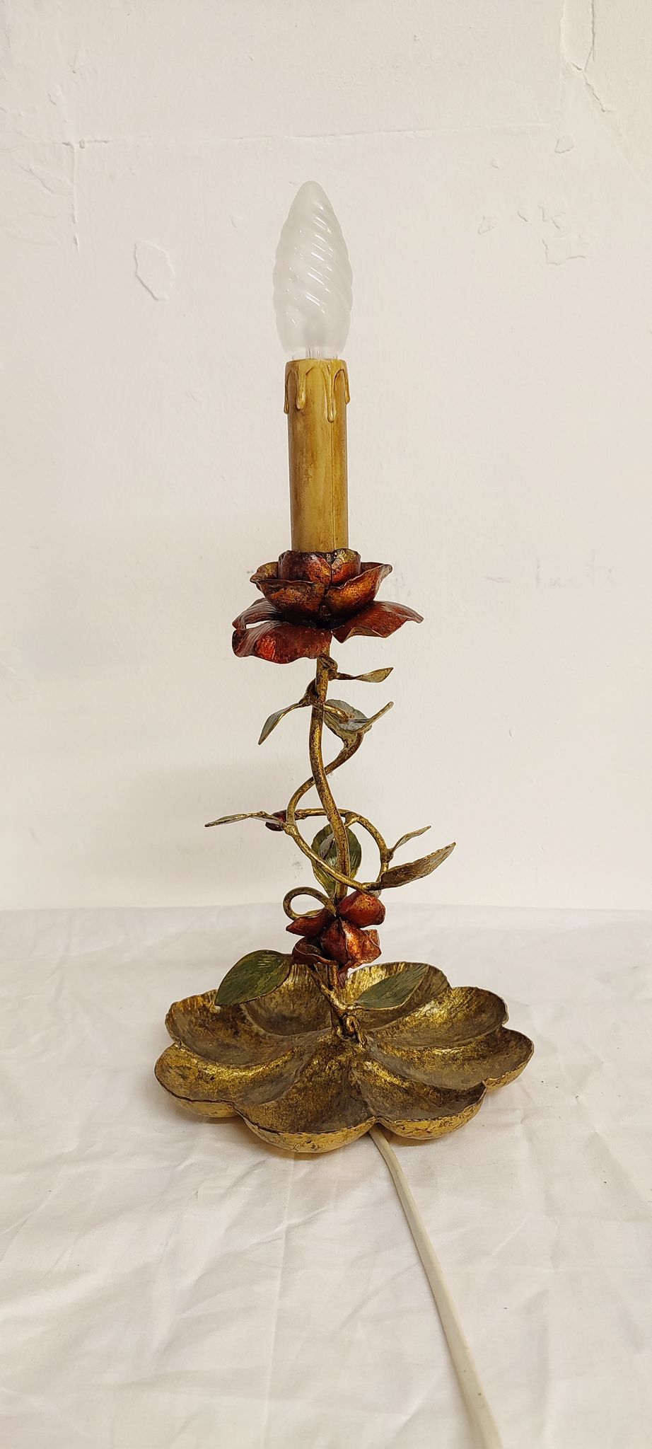 Wrought iron table lamp and gold leaf. France, 1950