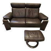 2-seater Stressless sofa with its footrest.