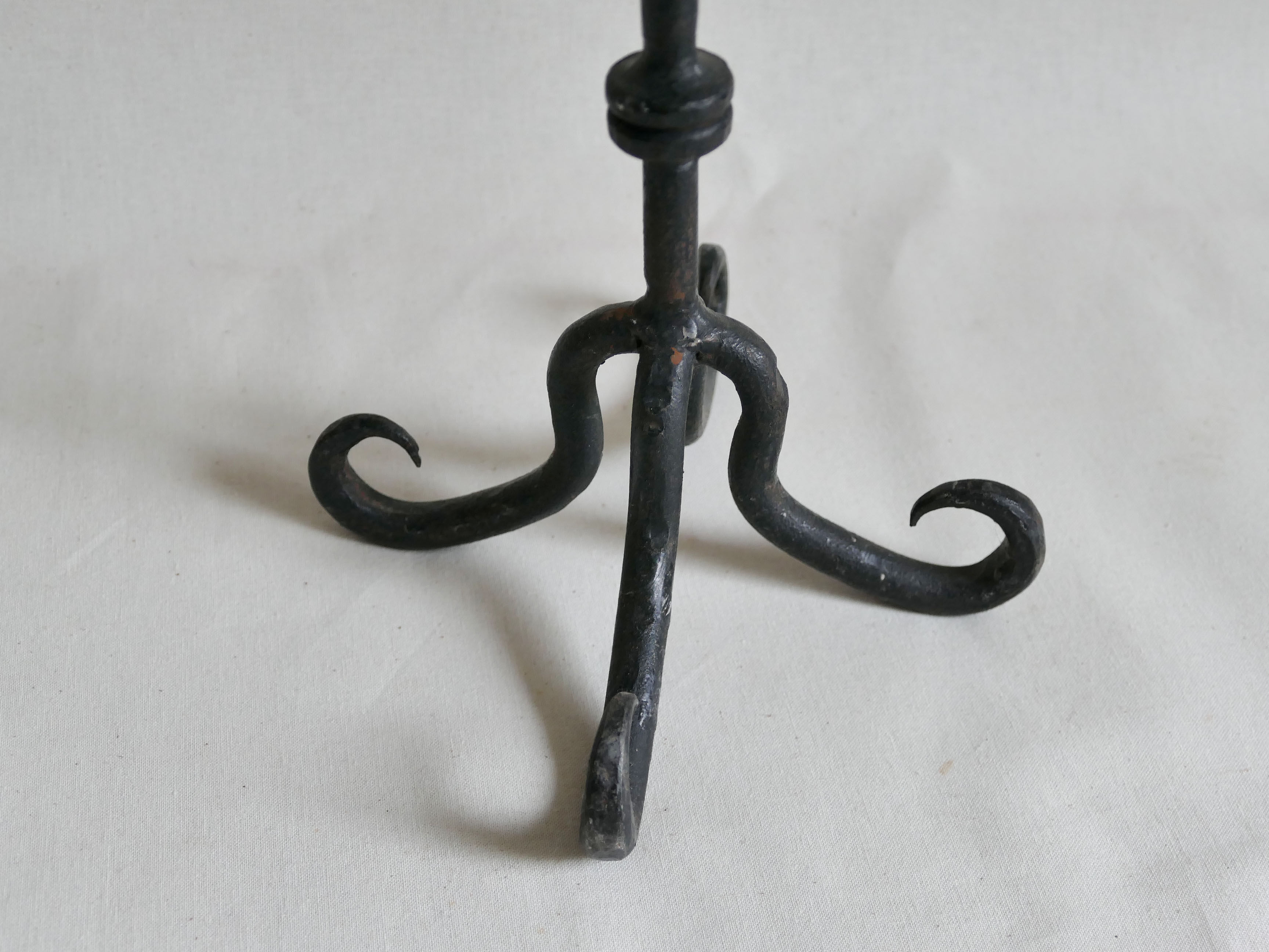 Pair of antique wrought iron chandeliers