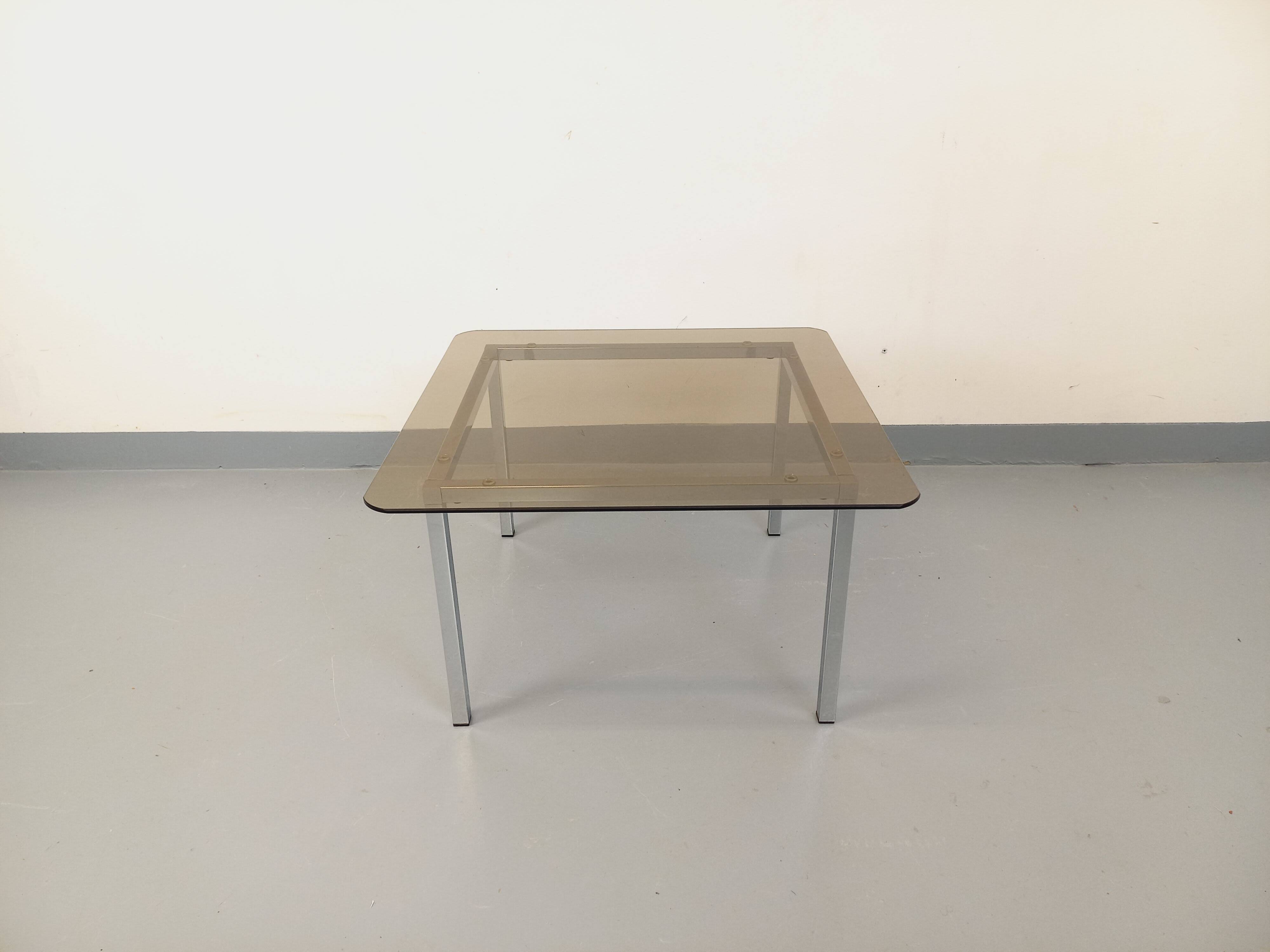 Vintage square coffee table in smoked glass and chrome metal from the 1970s.