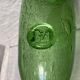 Biot-signed bubble glass bottle, green carafe