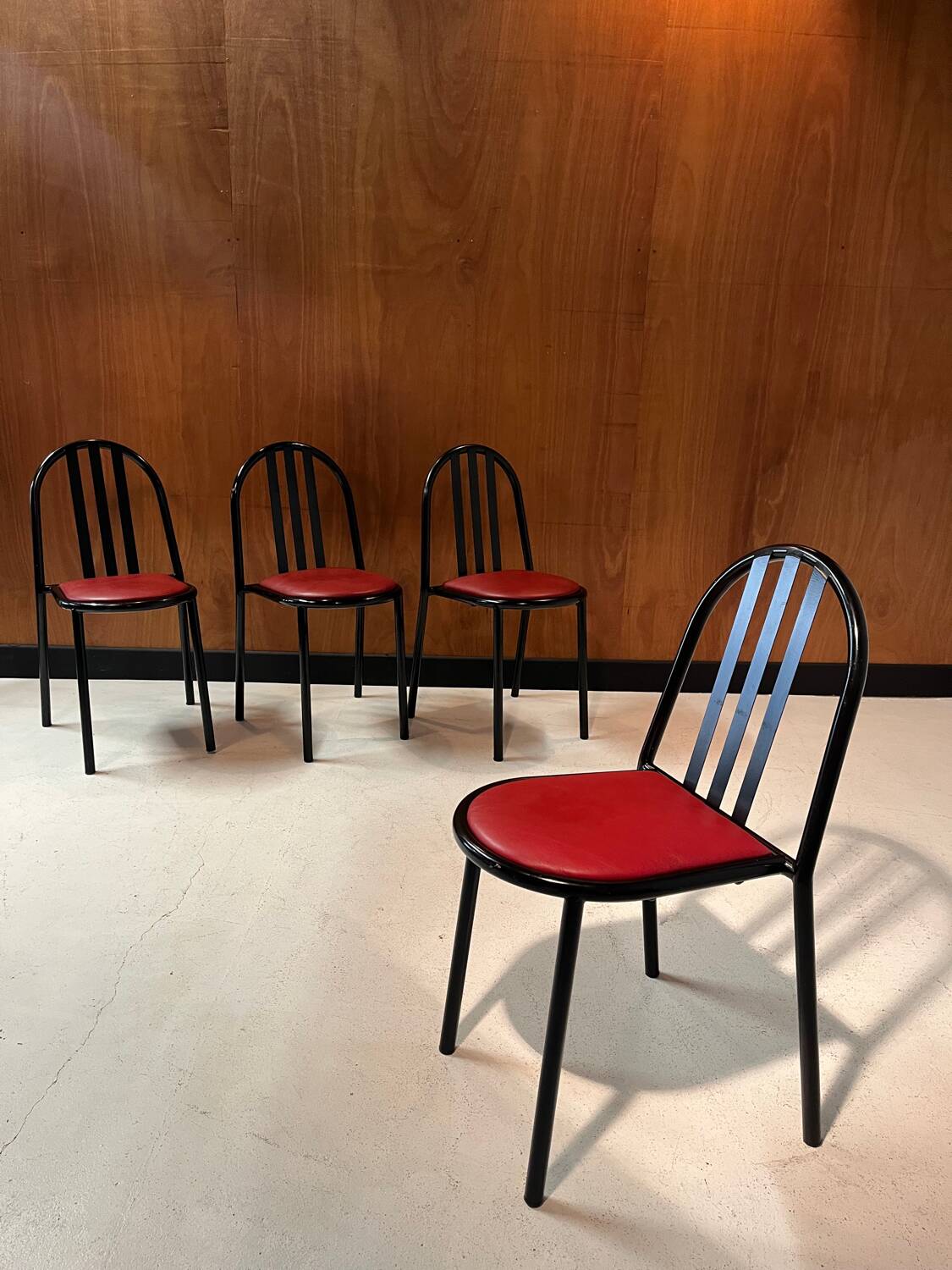 4 leather and steel chairs, designed by Robert Mallet-Stevens
