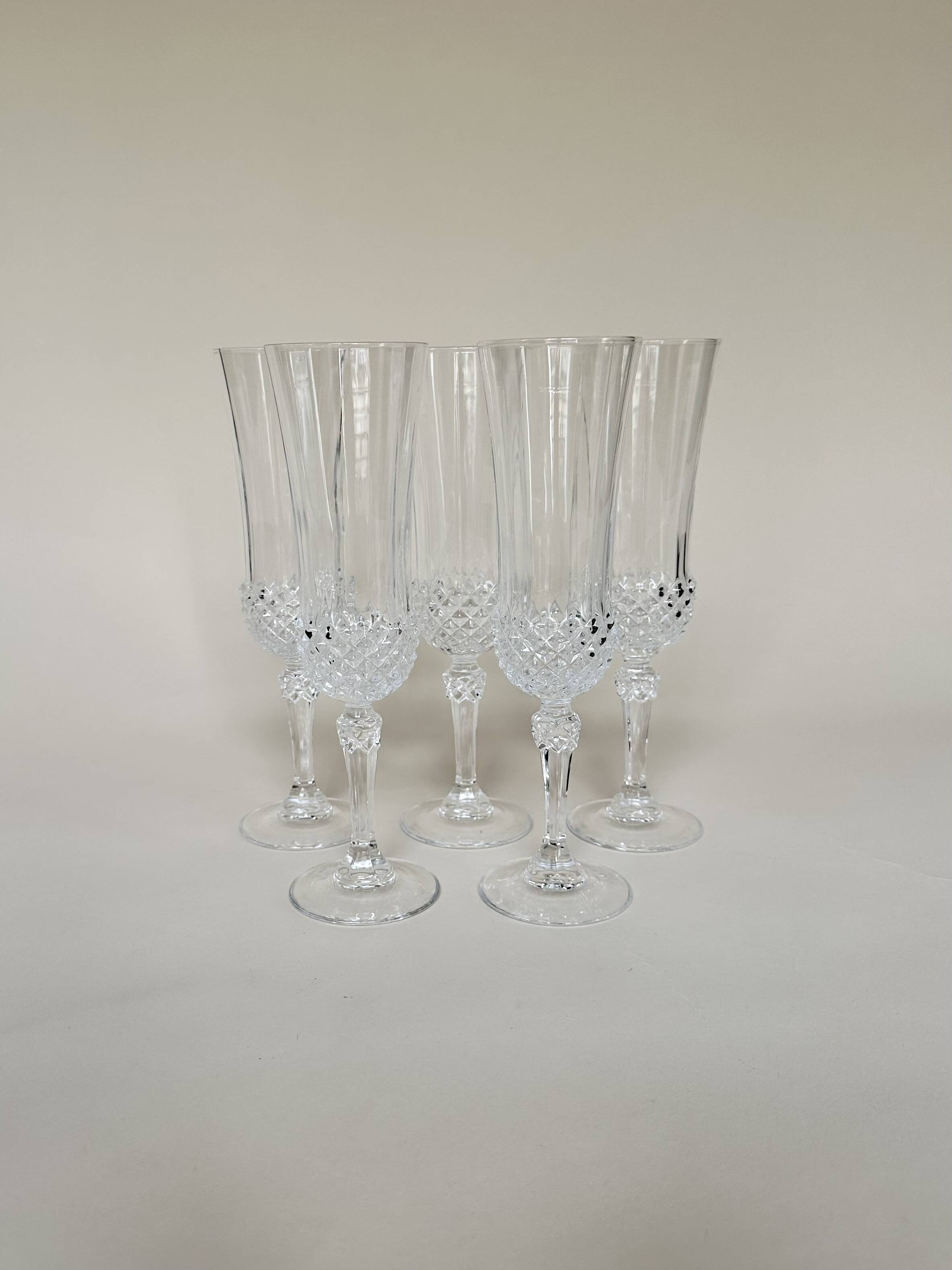 Set of 5 Cristal d'Arques champagne flutes