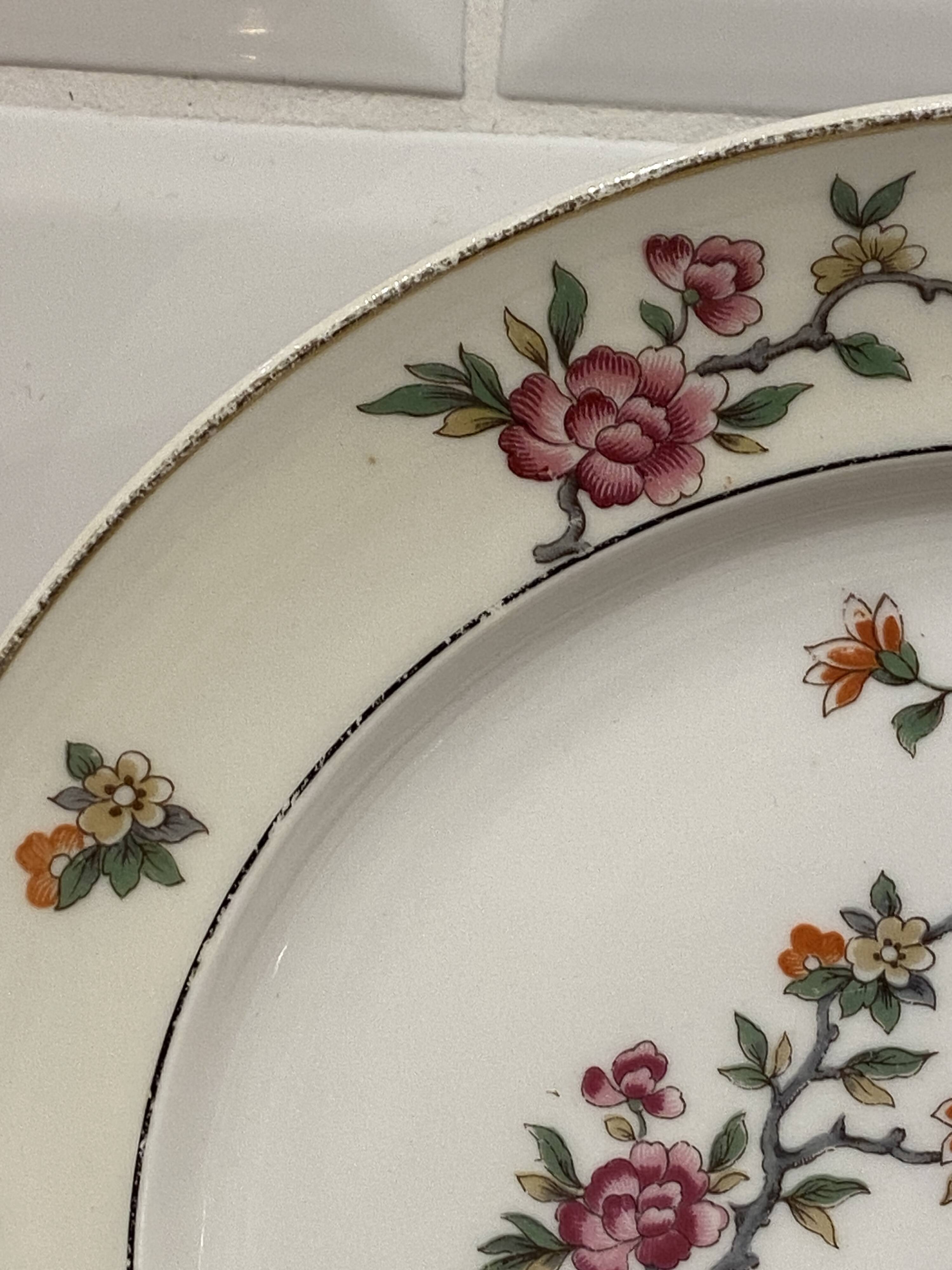 Set of 8 flat plates in Limoges porcelain