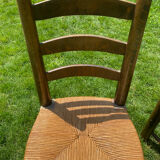 Pair of Georges Robert straw chairs