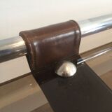 Coffee table in chrome, leather, and smoked glass