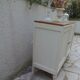 Vintage beige sideboard with oak top.