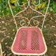 Perforated metal garden chairs and armchairs