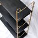 String modular shelf in gilded brass and black lacquered sheet metal Modernist DESIGN 1950-1960