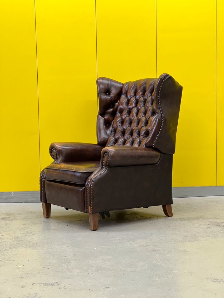 Brown vintage handmade chesterfield recliner armchair
