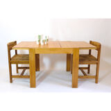 Pine dining table with extensions from the 1980s.