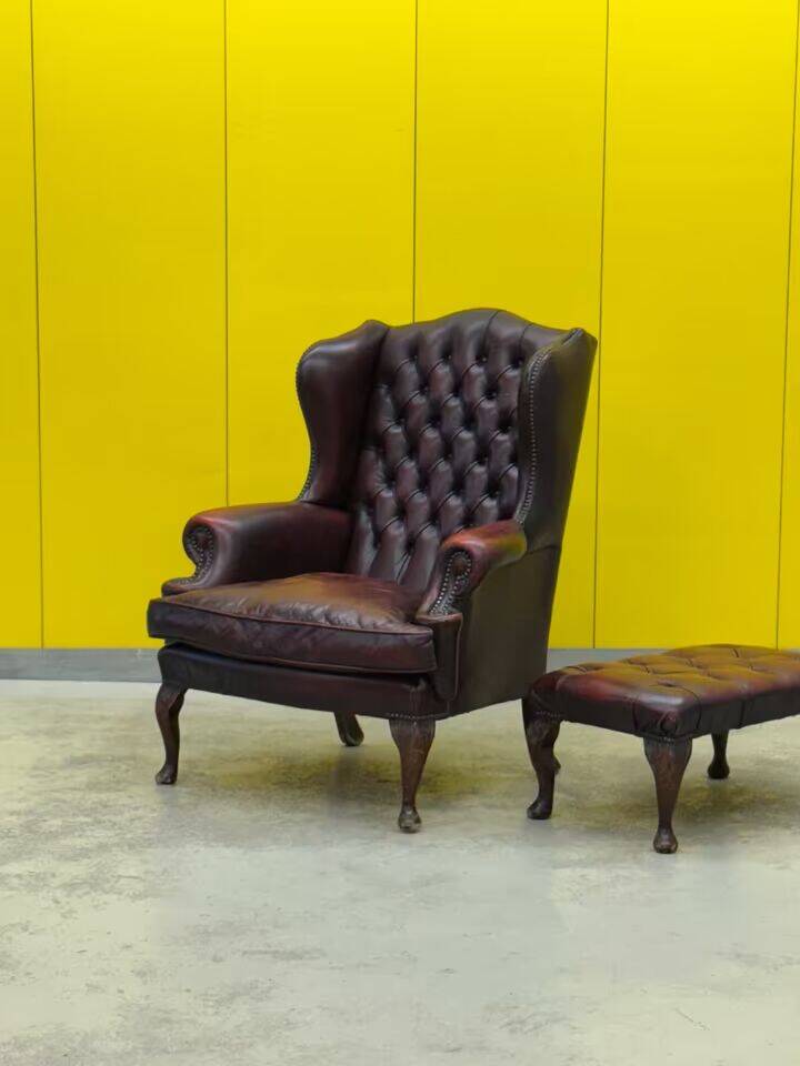 Burgundy leather chesterfield wing chair with Ottoman