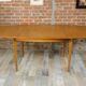 Wooden oval table and 6 matching chairs 60