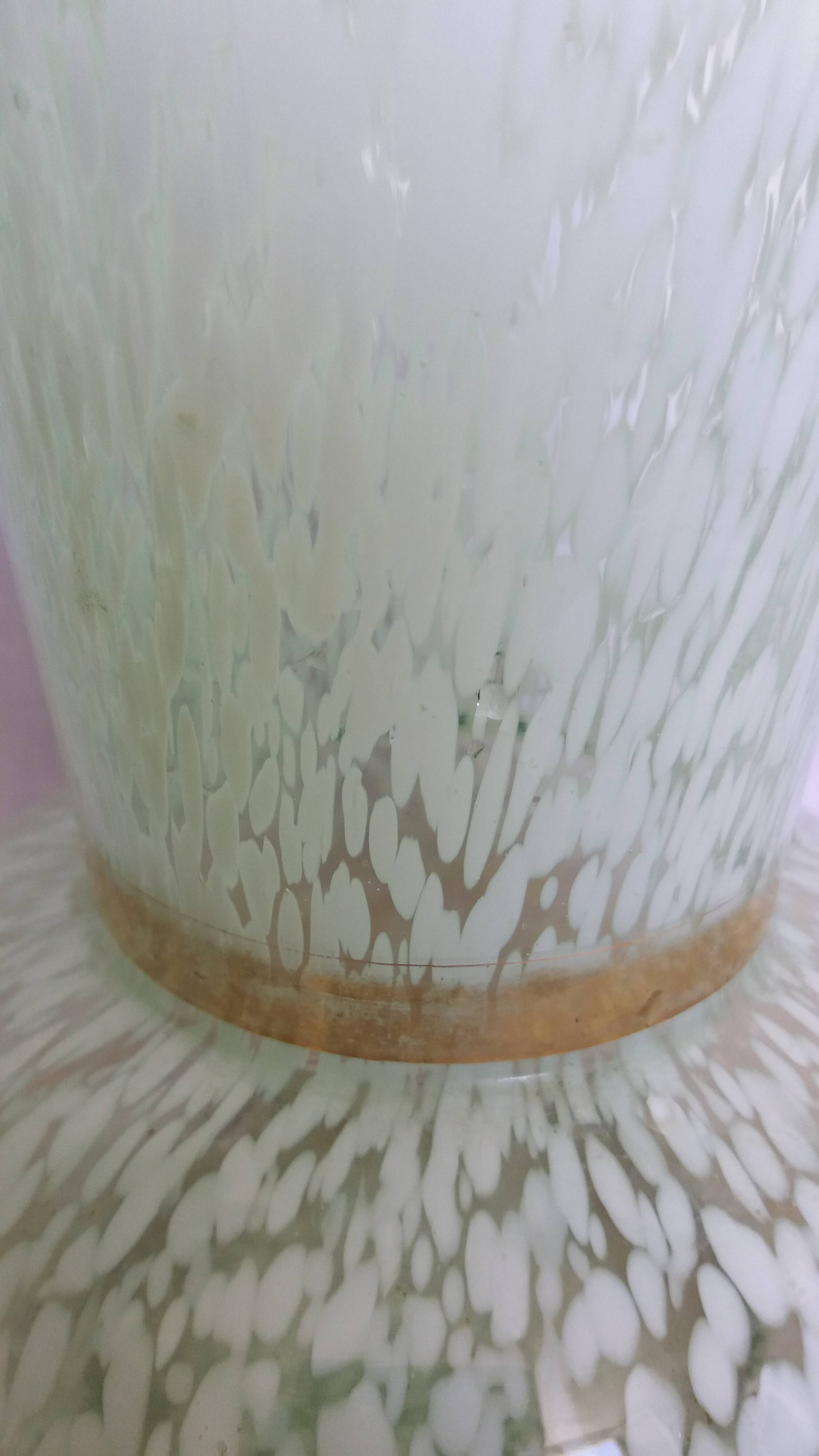 Green speckled glass vase from Clichy with gold threads.