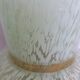 Green speckled glass vase from Clichy with gold threads.