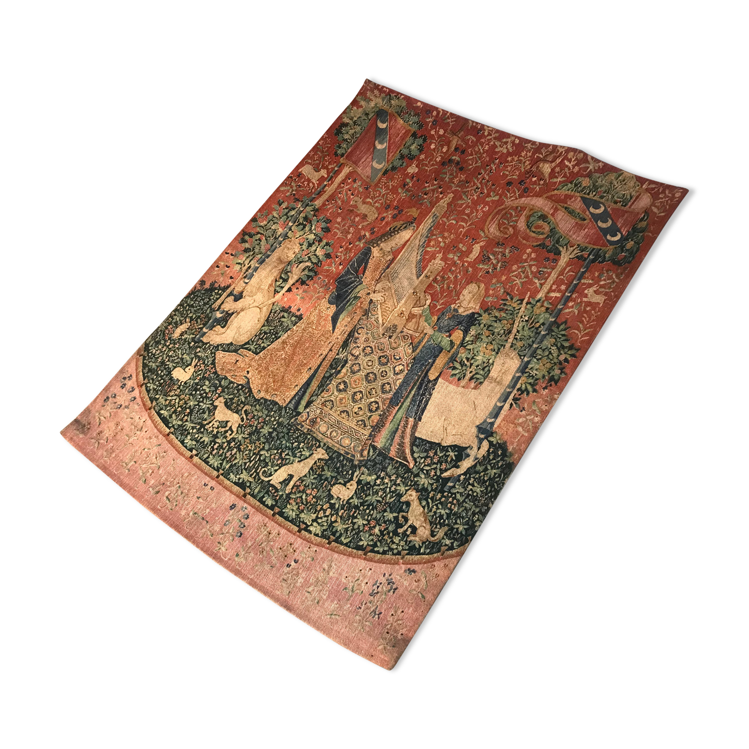 Tapestry reproduction of the lady with the unicorn
