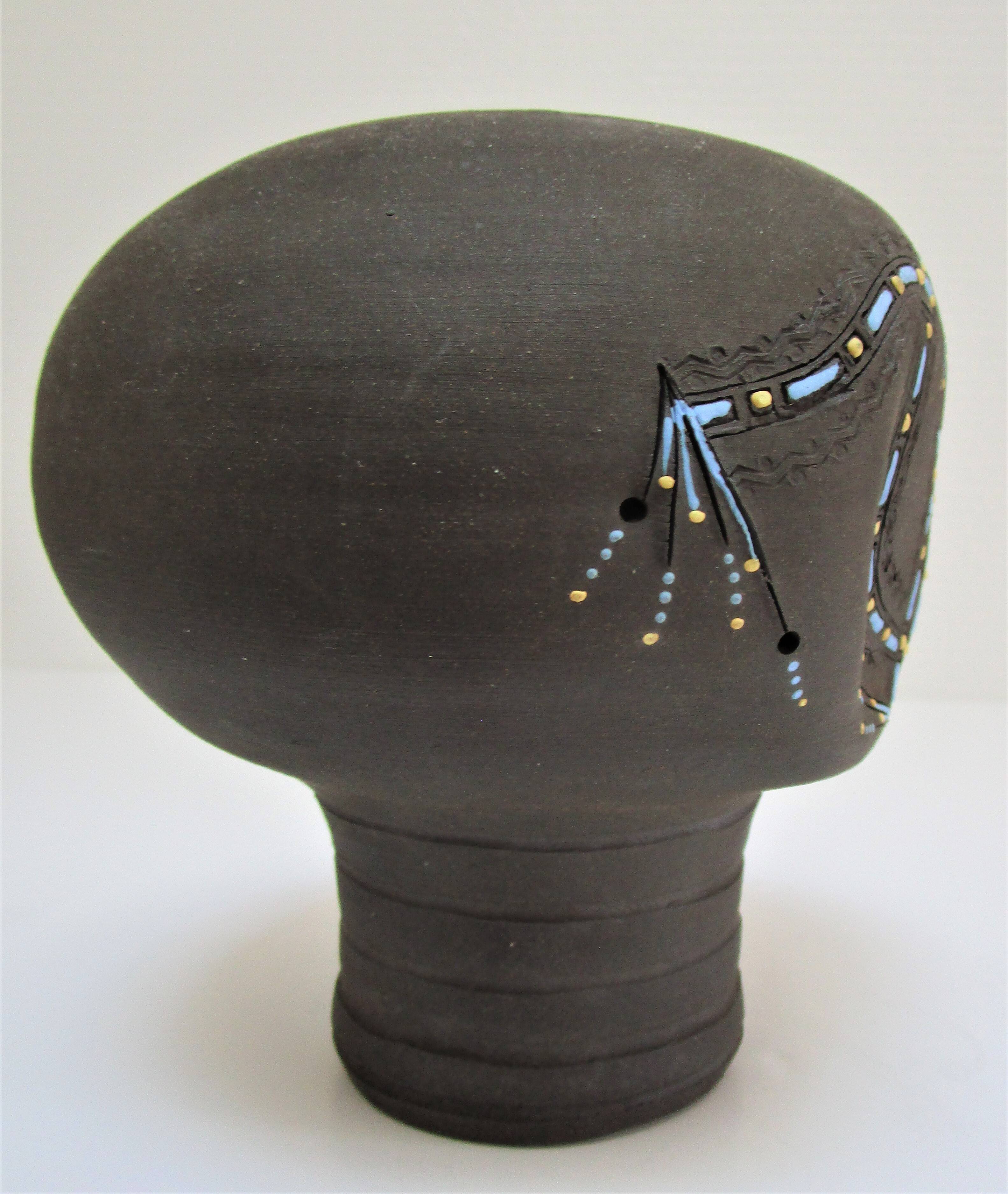 Anthropomorphic candle holder, scarified ceramic, stamped design