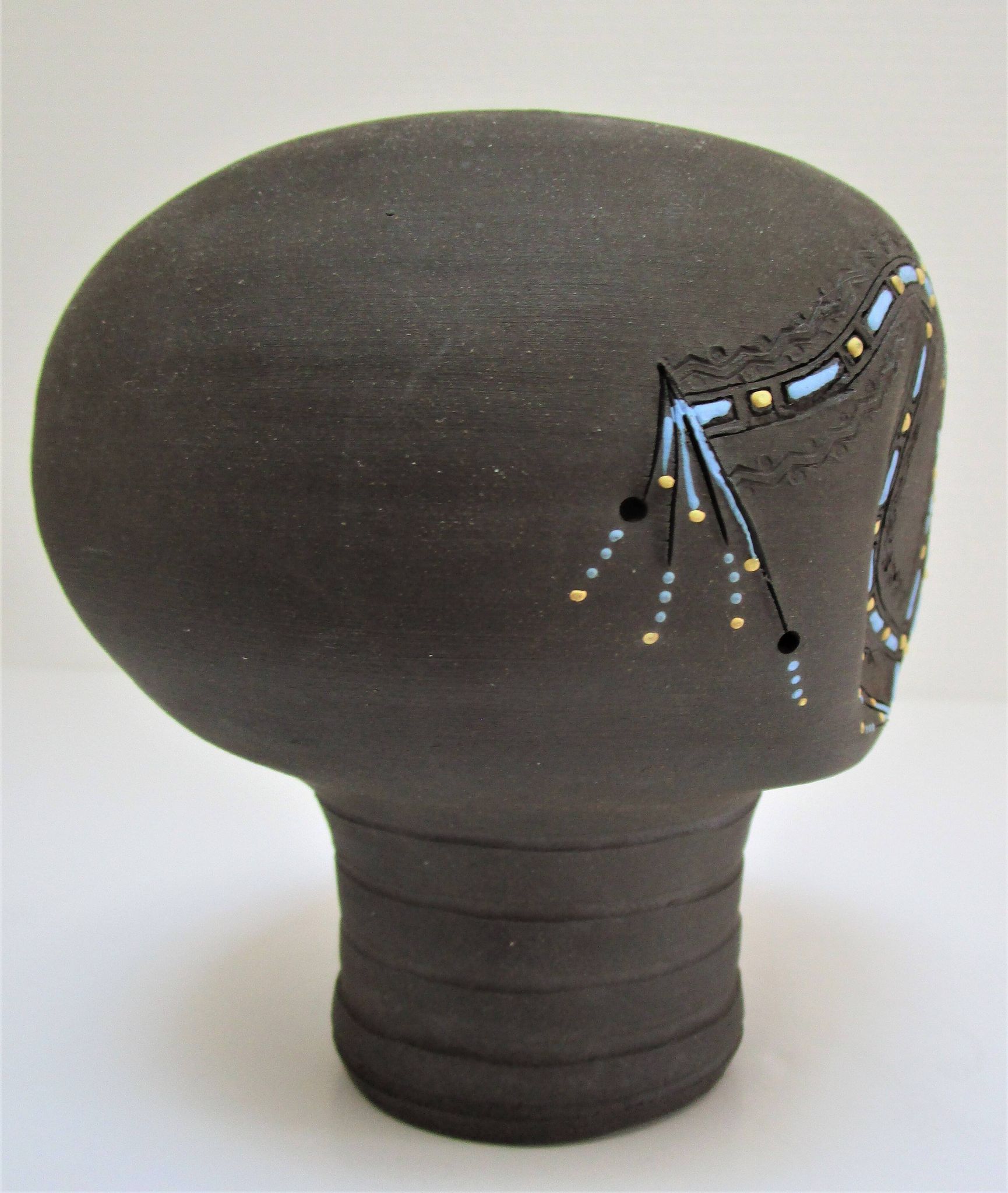 Anthropomorphic candle holder, scarified ceramic, stamped design