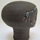 Anthropomorphic candle holder, scarified ceramic, stamped design