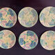 Set de 6 assiettes en barbotine vers 1930