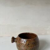 Old pyrite stoneware fondue pot