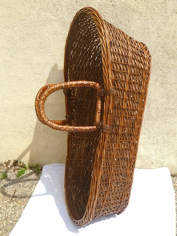 Old braided wicker couffin