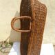 Old braided wicker couffin