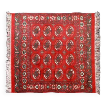 Tapis persan, fait à la main. 100X102 cm.