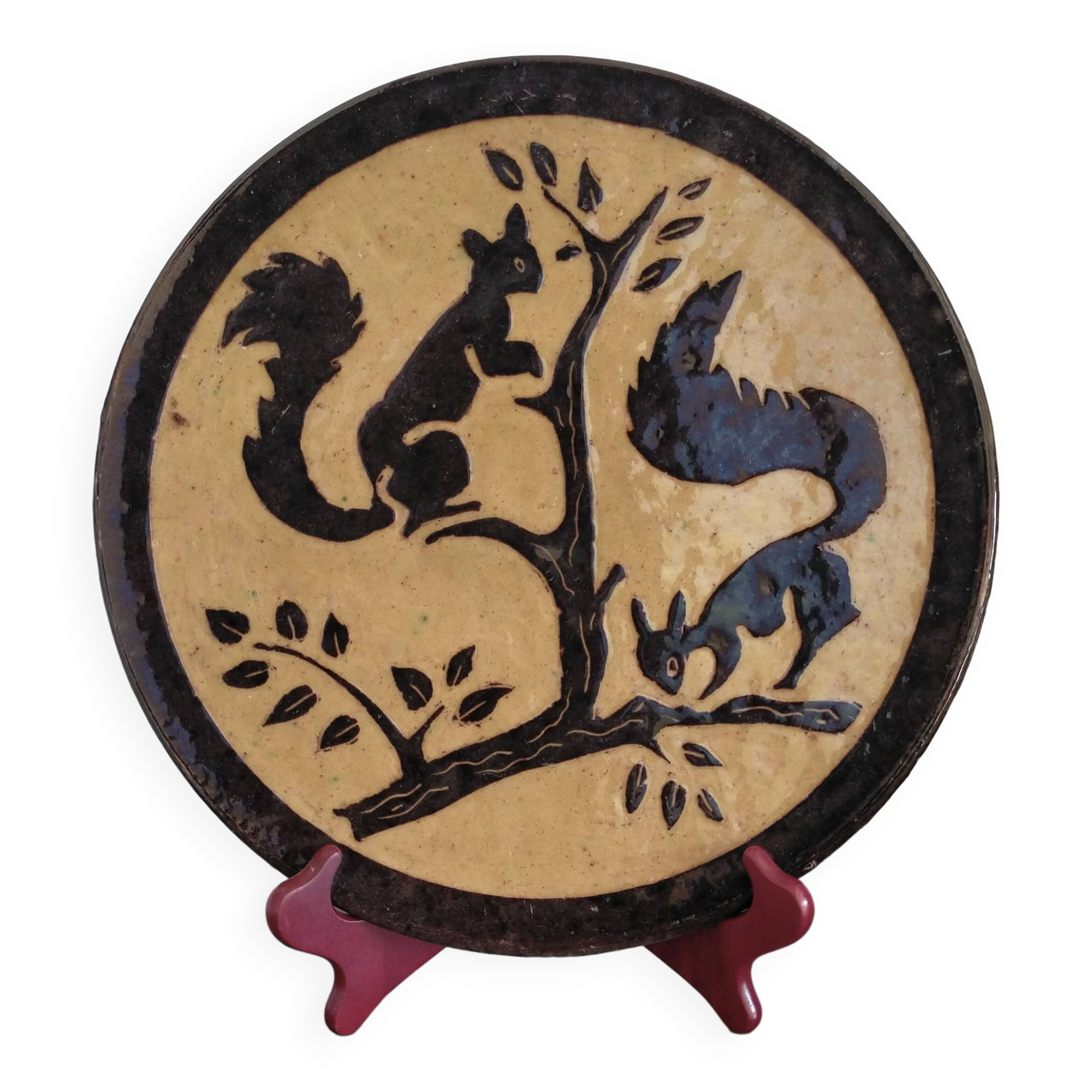 Vintage plate from Dauphiné in glazed terracotta with squirrels.