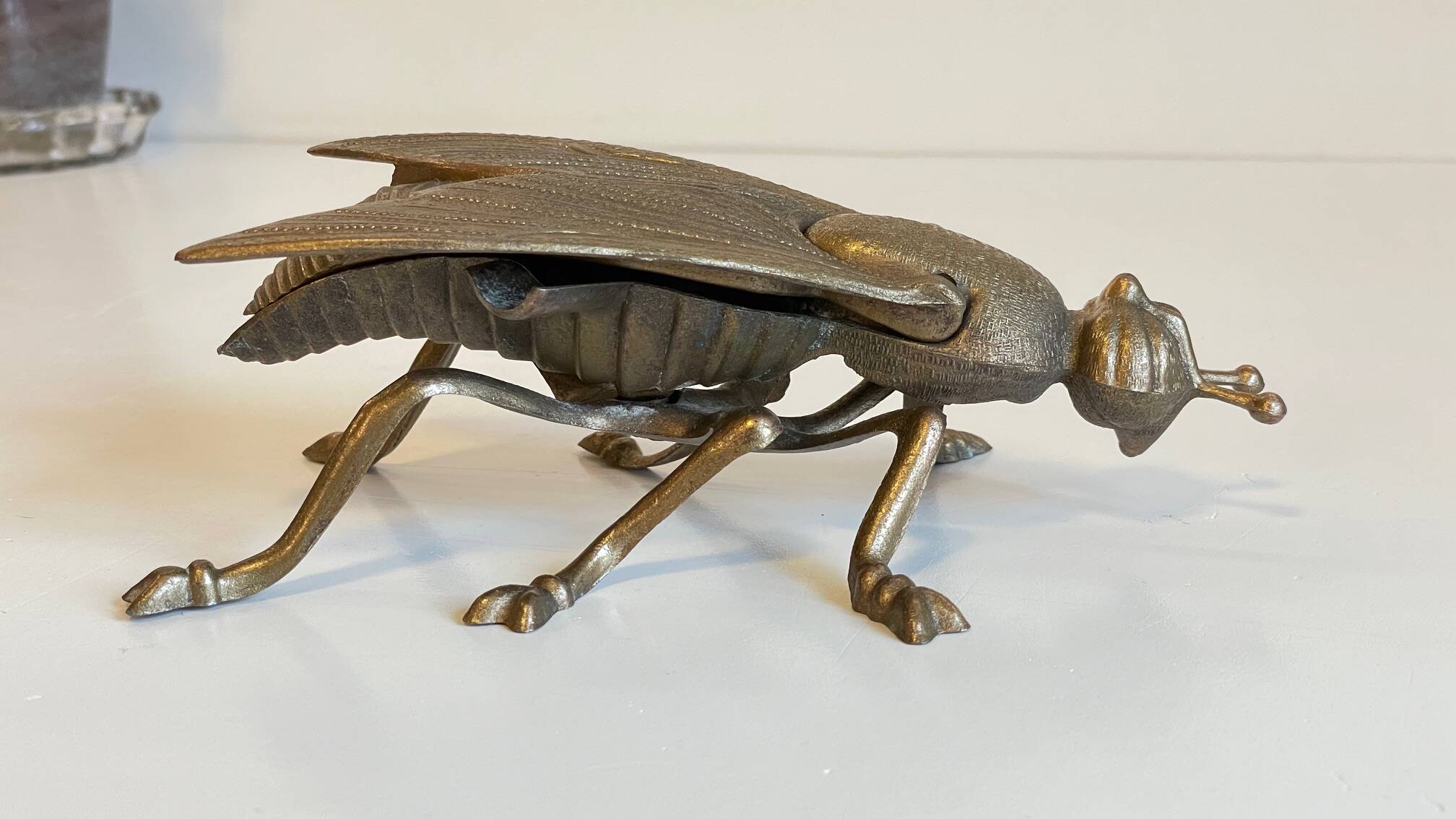 Vintage fly ashtray in patinated metal