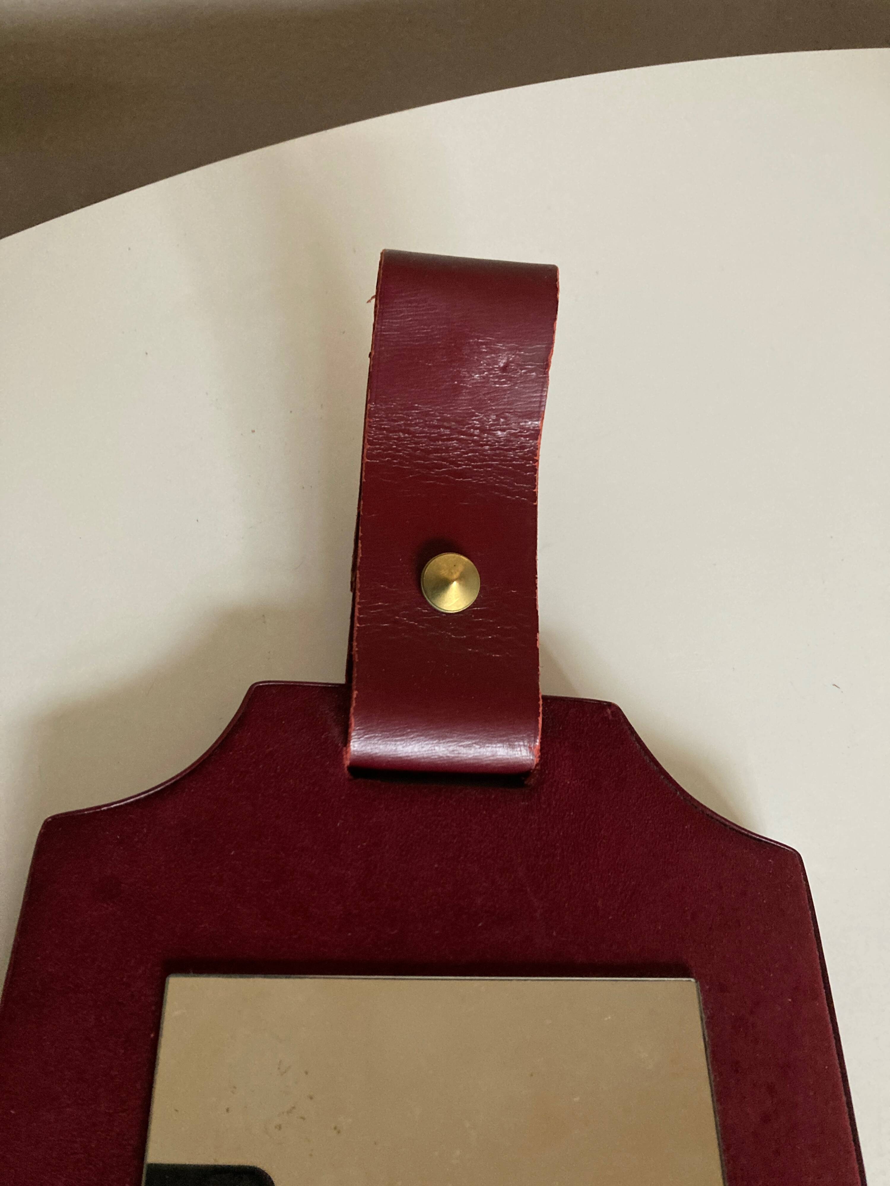 1960 cloakroom mirror with leather and brass shelf