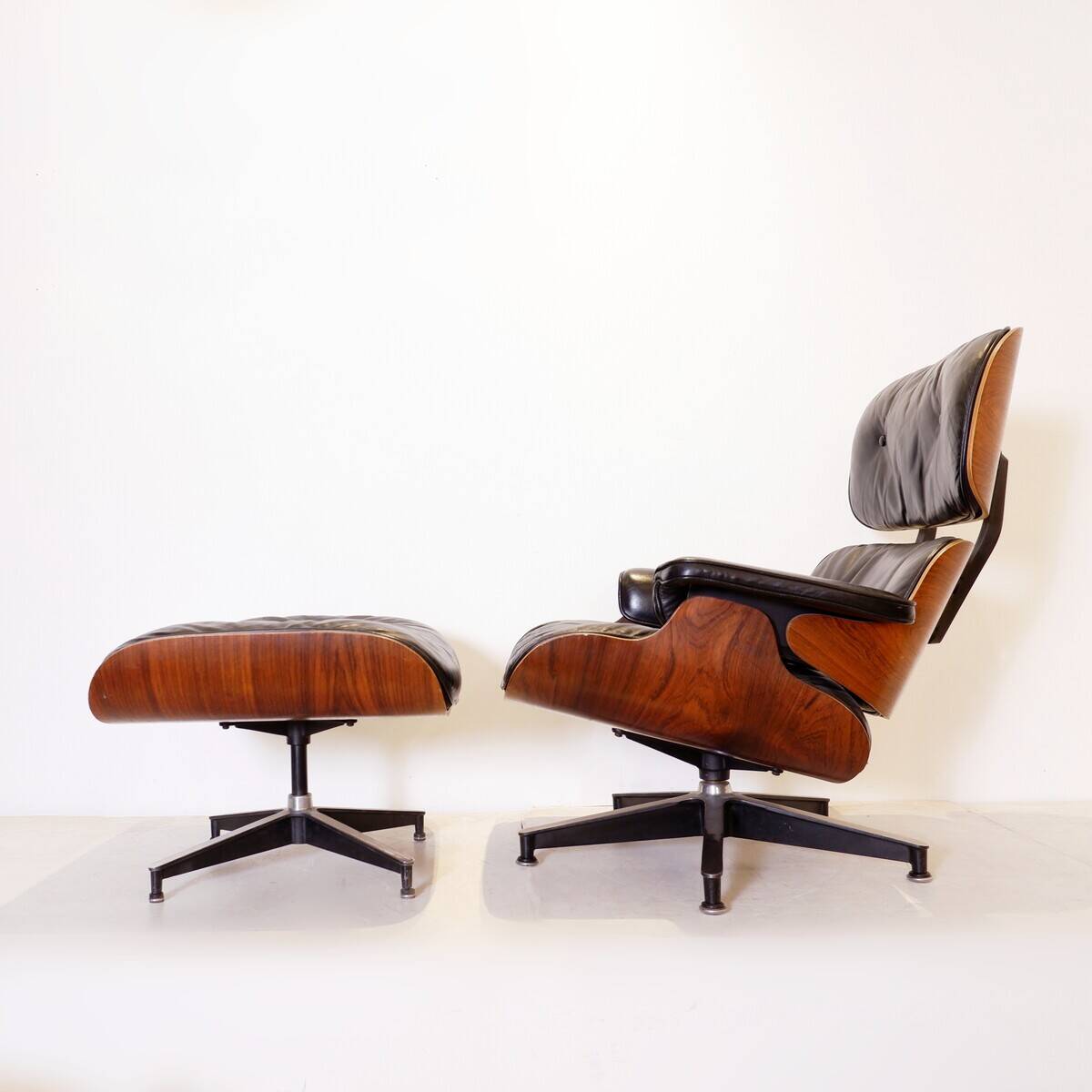 Mid-Century armchair and footrest by Charles & Ray Eames for Herman Miller