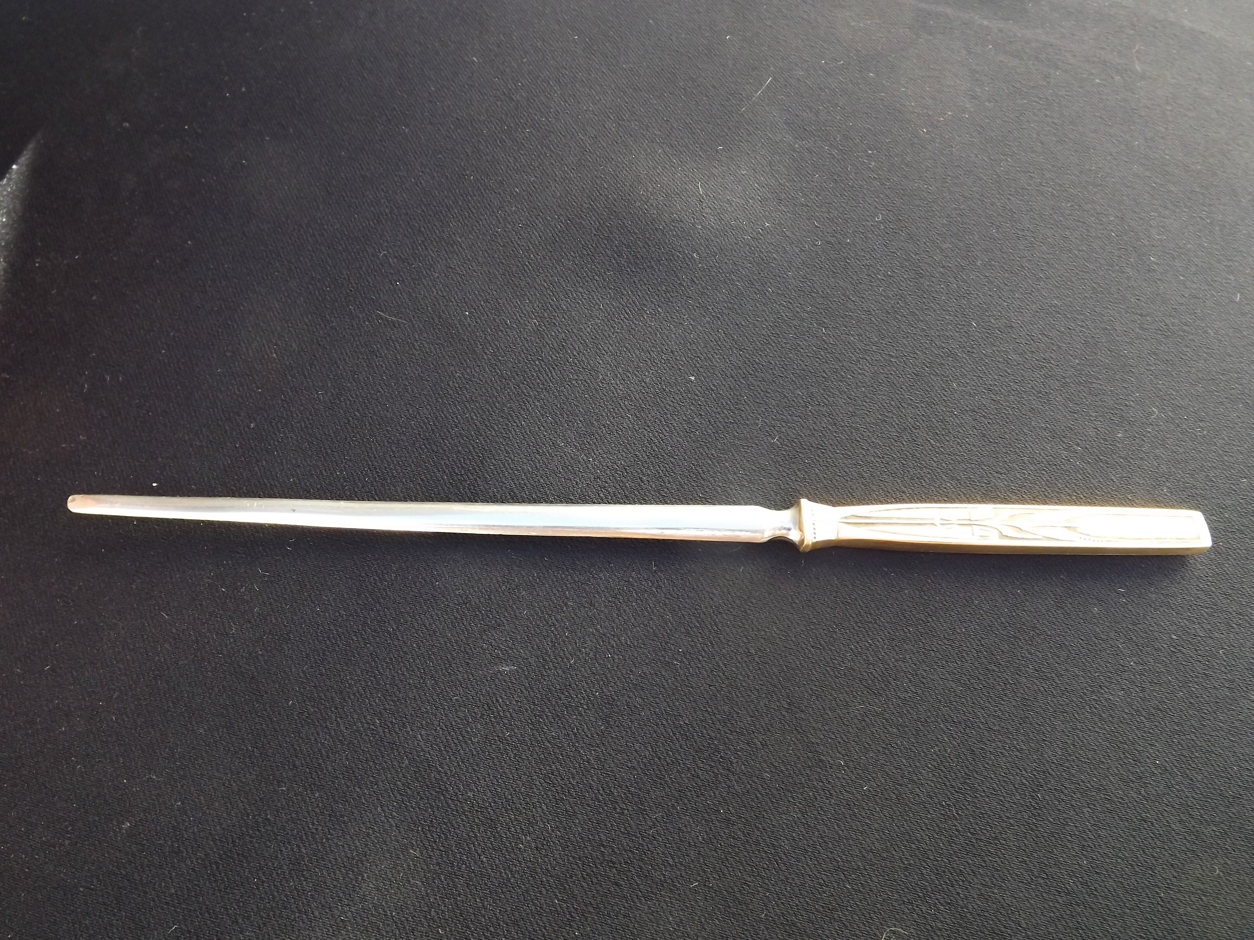 Letter opener or paper cutter