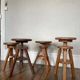 Set of 4 wooden screw stools.