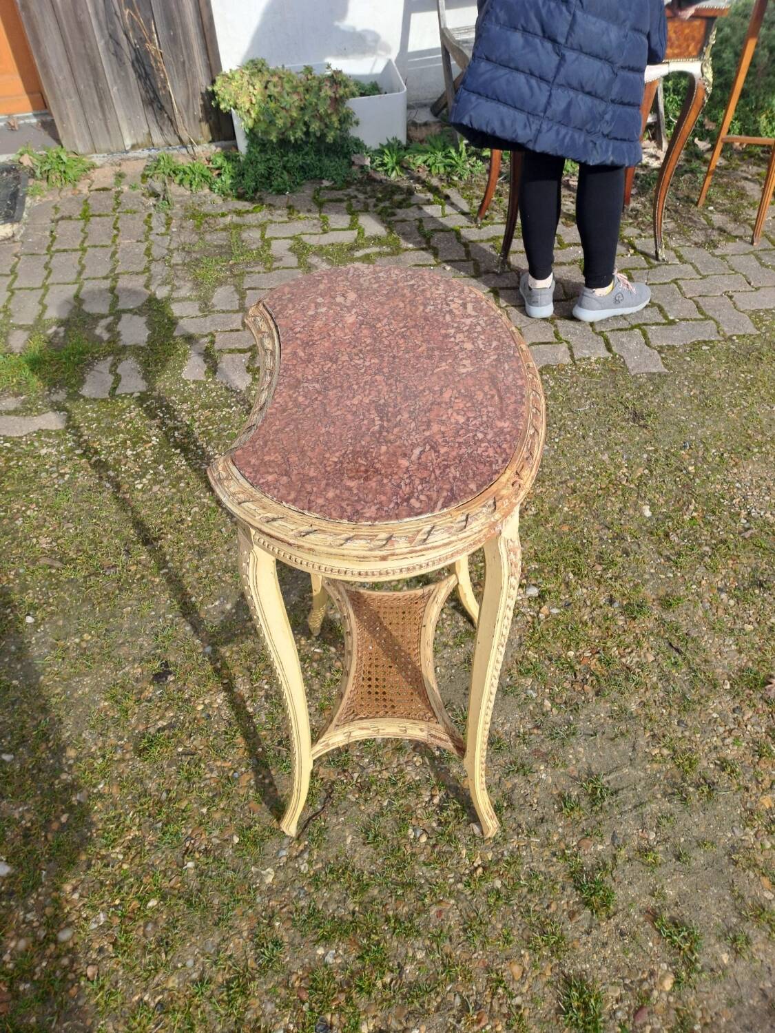 Patinated pedestal table in the transitional style of the 1900s with a marble top. Dimensions